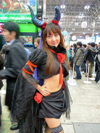 Illustration for article titled 2009's Cosplaying Arcade Game Booth Companions